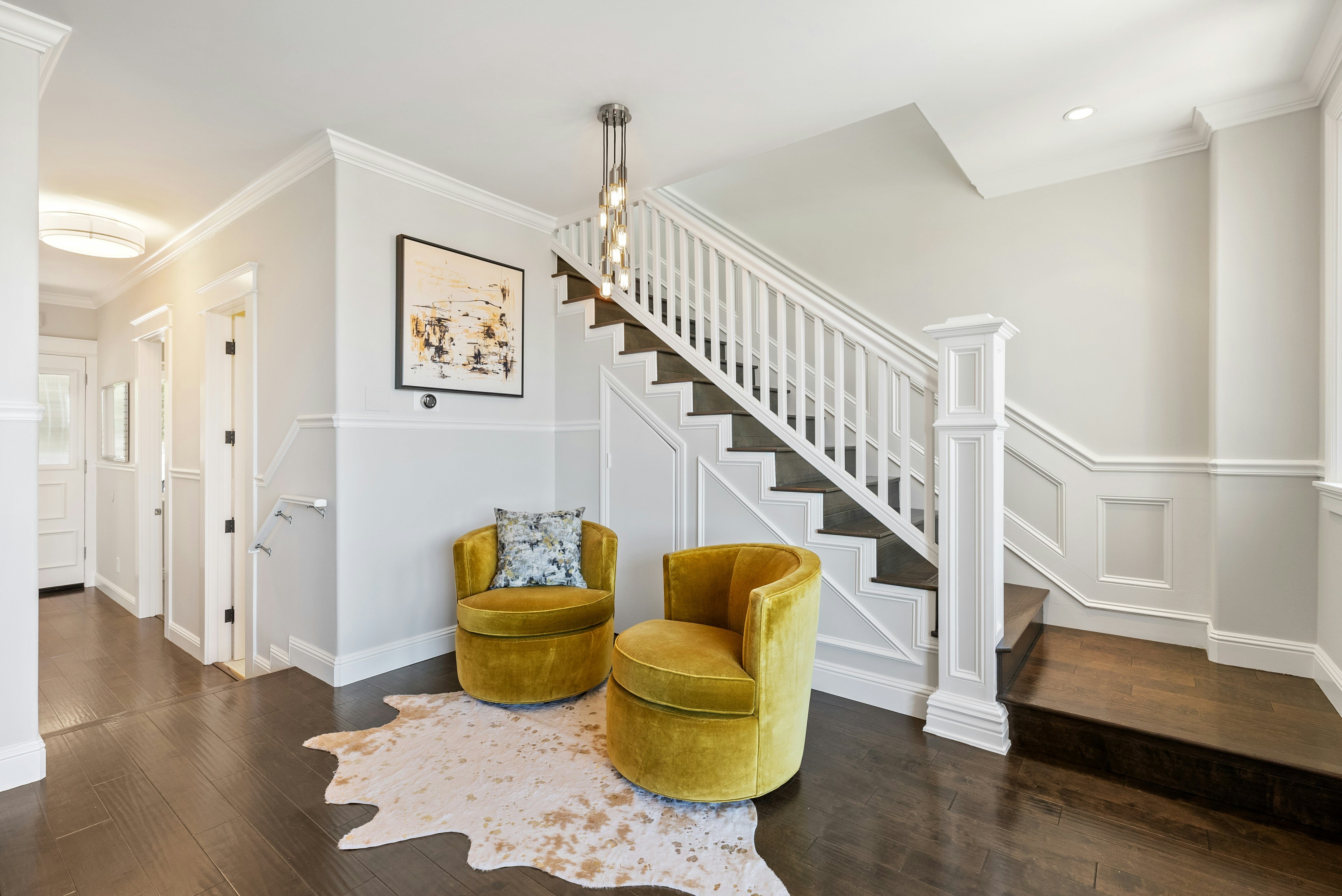 basement suite staircase, white walls